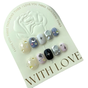 Star pattern cream blue and yellow handmade press-on nails with 3D star charms and rhinestones