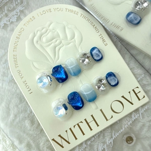 Handmade ocean blue mermaid press-on nails with 3D butterfly crystals and pearls