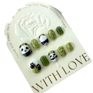 Hand-painted panda and bamboo press-on nails set with glossy green finish
