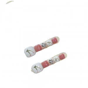 Summer toe press-on nails with white and pink glitter, cherry motifs, and rhinestones