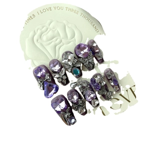 Handmade deep purple press-on nails with 3D metal butterfly and sparkling gemstones
