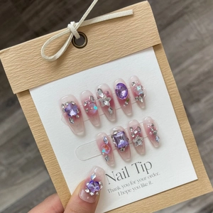 Handmade 3D nail tips with pink-purple gradient, large gemstones and floral accents