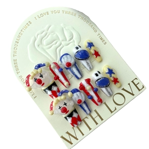 Handmade clown-themed circus press-on nails with 3D relief art and colorful glitter stripes