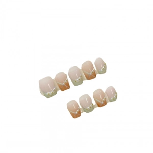 Handmade press-on nails set with peach pink gradient, pearls and gold bead accents
