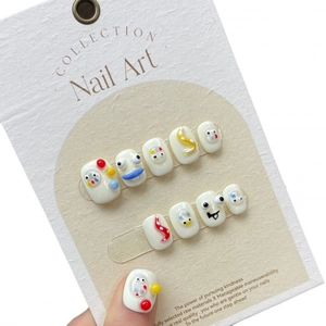 3D handmade press-on nails with cartoon eyes and colorful abstract 3D patterns