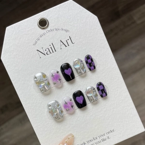 Handmade press-on nails set featuring Y2K black and purple checkered star designs