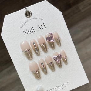Champagne gold mirror French press-on nails with 3D pink heart rhinestones and glitter