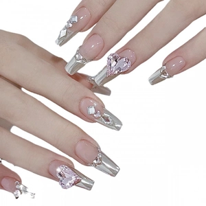 Silver mirror French manicure with 3D pink heart rhinestones on long coffin nails