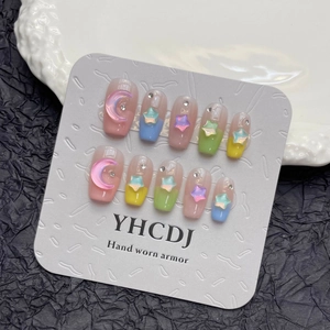 Handmade macaron star press-on nails with 3D resin moon and rhinestones
