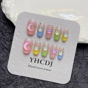 Handmade press-on nails with 3D aurora stars and macaron candy colors for a sweet look