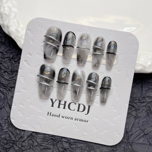 Gothic ink marble press-on nails with 3D silver ring accents and dark smoke textures
