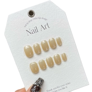 Coffret de 10 faux ongles faits main effet œil de chat doré, forme ronde courte