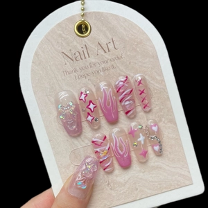 Handmade Y2K pink coffin press-on nails with 3D bows, glitter, and flame patterns