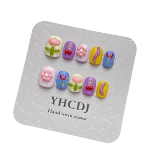 Handmade 3D tulip and floral press-on nails in pastel colors for a cute summer look