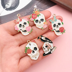 Gothic skull charms with rose and butterfly motifs for DIY jewelry necklaces