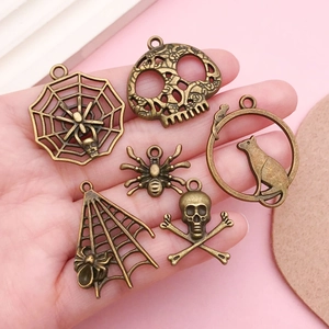 6pcs vintage bronze Halloween charms featuring skull, spider, and web for DIY jewelry