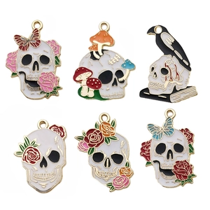 Skull and rose enamel charms set for DIY jewelry making with gold-plated alloy frames