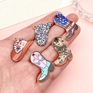 Five colorful Western cowboy hat and boot alloy pendants with trendy patterns on palm