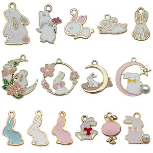 Selection of 15 cute enamel rabbit charms with gold plating and pearl details for DIY crafts