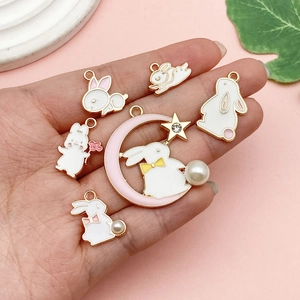 Cute enamel rabbit charms in moon and floral designs with faux pearls for DIY jewelry