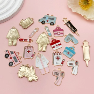 Medical themed enamel charms featuring ambulance, syringe, and doctor coat designs