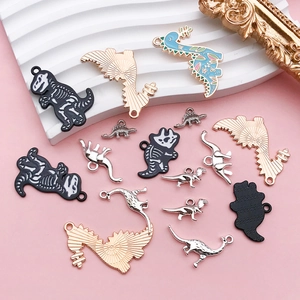 Mix van kleurrijke emaille dinosaurus bedeltjes voor DIY-kettingen en sieraden maken