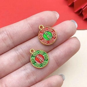 Detailed close-up of Chinese style enamel pendants with Jixiang and Ruyi text