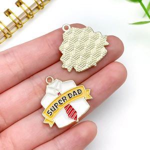 Close-up of Super Dad enamel shirt charm with red tie for Father's Day DIY gift