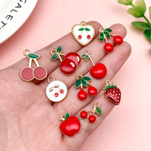 DIY enamel fruit charms in cherry and strawberry shapes with gold-plated alloy edges