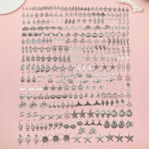 DIY mixed silver ocean charms collection featuring sea turtles, seahorses, and starfish