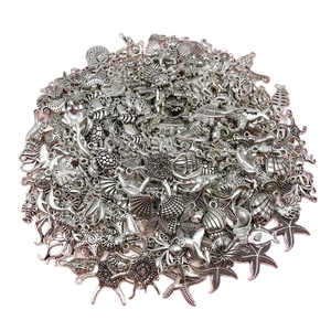 Antique silver ocean charms collection featuring starfish and shells for DIY jewelry making