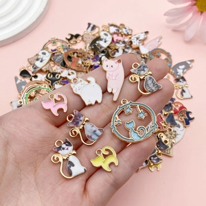 Assorted enamel cat charms in various colors and poses for DIY jewelry making