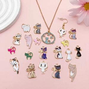 Cat theme enamel alloy charms set for DIY jewelry making on pink background