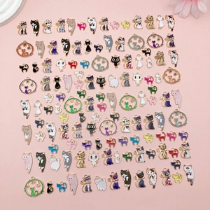 Detailed close-up of colorful cat enamel charms with metal finish for DIY jewelry making