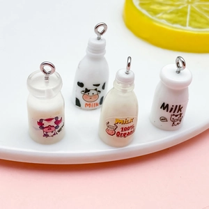 DIY resin milk bottle charms with cartoon cow motifs and organic labels for jewelry