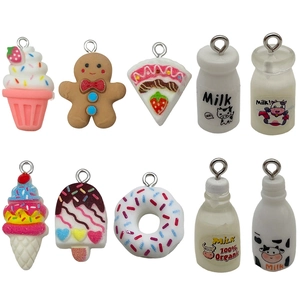 DIY resin dessert charms including gingerbread man and milk bottles for bag pendants