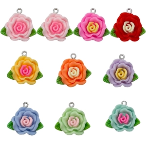Set of colorful resin camellia flower pendants with green leaves and metal rings