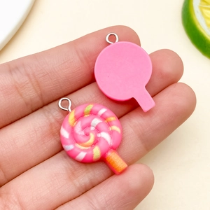 Front and back views of pink 3D resin lollipop pendants for DIY jewelry and bag charms