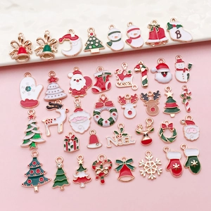 Detail of Christmas enamel alloy charms including Santa, elk and snowflake pendants
