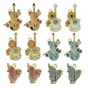 Colorful enamel musical instrument pendants with floral patterns in violin and guitar shapes