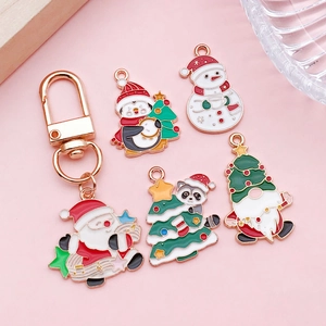 Set di ciondoli natalizi smaltati con Babbo Natale pinguino e pupazzo di neve per gioielli DIY