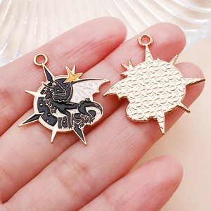 Detailed macro view showing dragon moon enamel pendant with metallic mesh texture back
