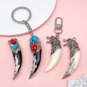 Pendentifs dent de loup ethniques en résine avec gravure de tête de loup et turquoises