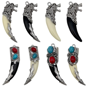 Set of 8 vintage tribal style tooth pendants with wolf head carving and colorful stones
