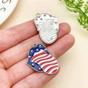 Detail of lip-shaped US flag enamel pendants with metal texture for DIY jewelry making