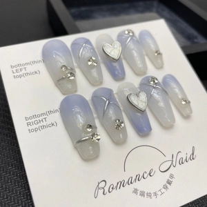 Handmade light blue gradient press-on nails with silver hearts and rhinestones decor