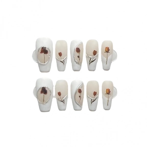 Handmade press-on nail set with white base and vintage rose flower art designs
