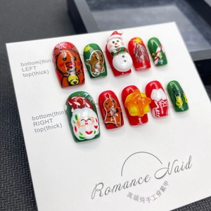Handmade 3D Christmas press-on nails with Santa, reindeer and snowman designs