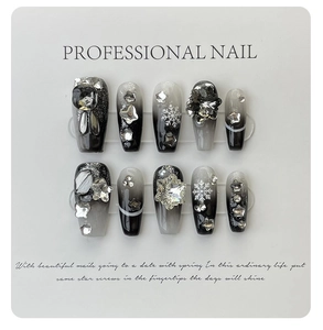 Detail of 10pcs black grey gradient press-on nails with snowflakes and 3D rhinestones
