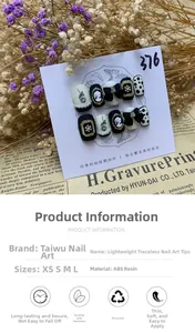 Detail of handmade black press-on nails with bow, pearl, and vintage portrait motifs